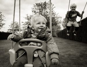 Kids on a daycare swing